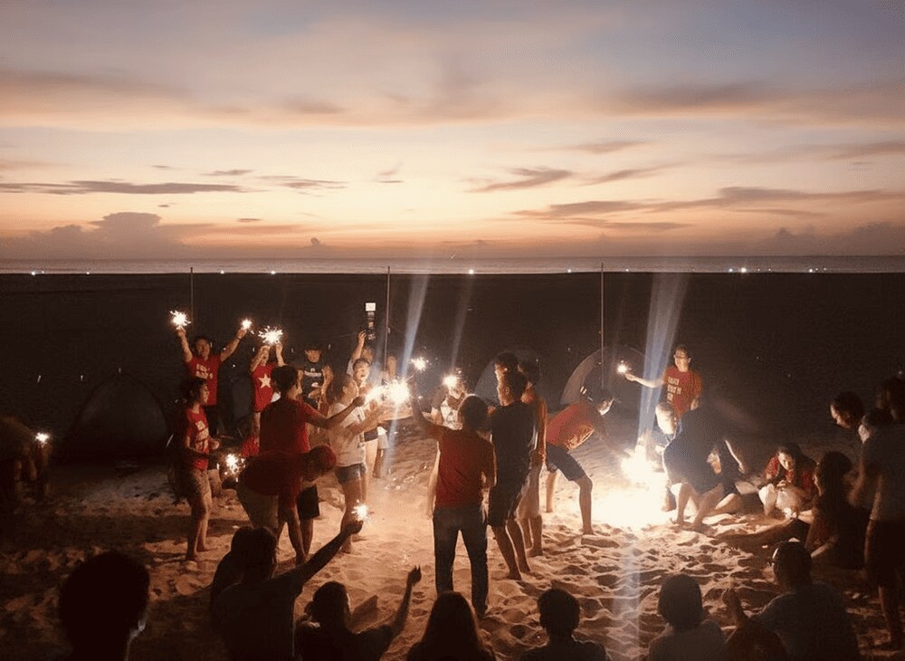 Lighting a campfire and enjoying meaningful talks with friends at Ky Co Beach helps melt away stress and fatigue